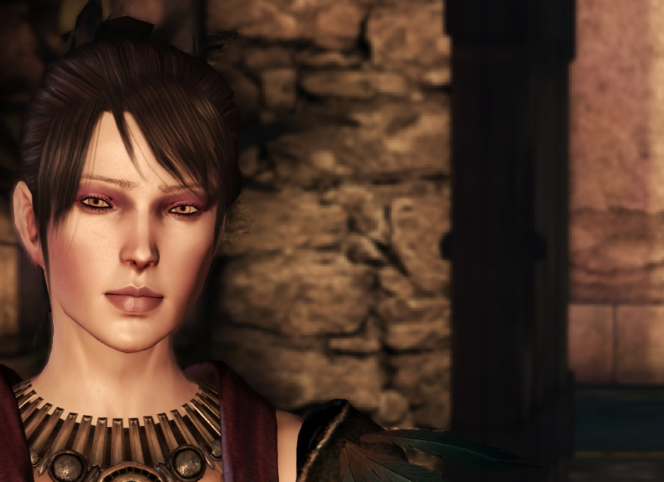 Morrigan stands in a castle room, fire-lit. There is a dark doorway behind her.