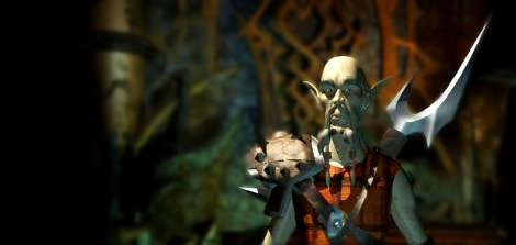 Dak'kon from Planescape: Torment. A bald man with a moustache in a plaid tunic and spiky fantasy armor, with a remarkably large sword.