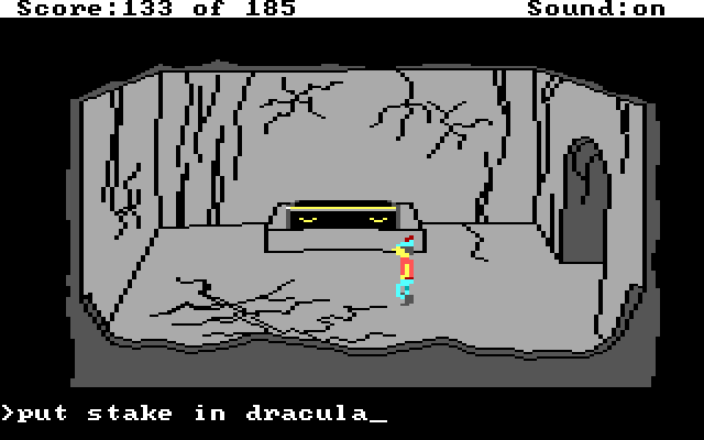 Graham stands by a coffin. Input text: "put stake in dracula"