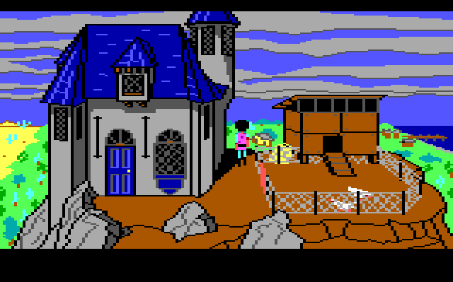 A small, Gothic-looking blue house on top of a rocky mountain. There's a chicken hutch and some chickens next to it. Gwydion, the main character, stands in between them looking over the landscape.