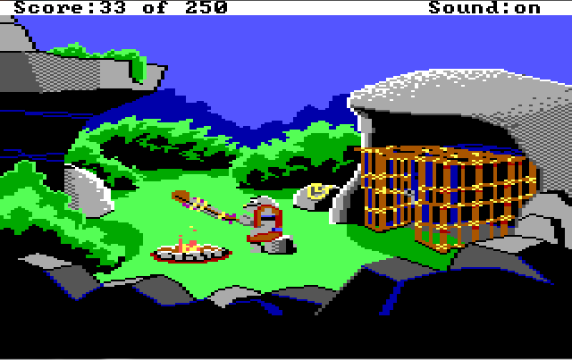 A rocky area with a campfire in the middle and an open wooden cage at the right side of the screen, under a rocky overhang. A gray lizard-man sits by the fire, roasting Roger on a stick. 