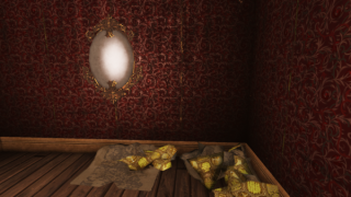 First person camera. A corner of a room covered in rich but peeling wallpaper in dark red and gold. A cloudy oval mirror with an ornate gold frame is on the wall. There is a pile of crumpled yellow wallpaper on the floor. The floor is bare wood.