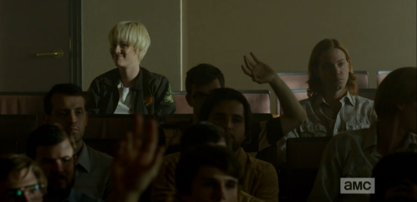 Still from Halt and Catch Fire. Same scene as previous image. A lone woman with short blonde hair sits in the back of a classroom. The students in front of her are all men.