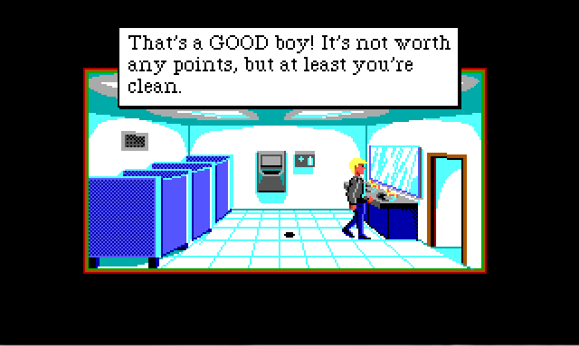 Sonny stands in a public bathroom. There are several blue stalls along the left wall. Sonny stands in front of a row of sinks and a mirror on the right wall. Game text reads: "That's a GOOD boy! It's not worth any points, but at least you're clean."