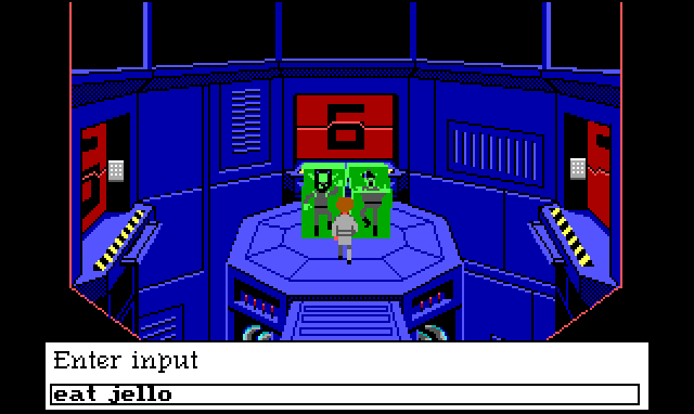 Roger stands in a large cylindrical room with an octagonal platform in the center. On the platform are two green jello blocks with people encased in them. There are four doors entering in the chamber, but only the south door has a ramp extending to the platform. Input text reads: "eat jello"